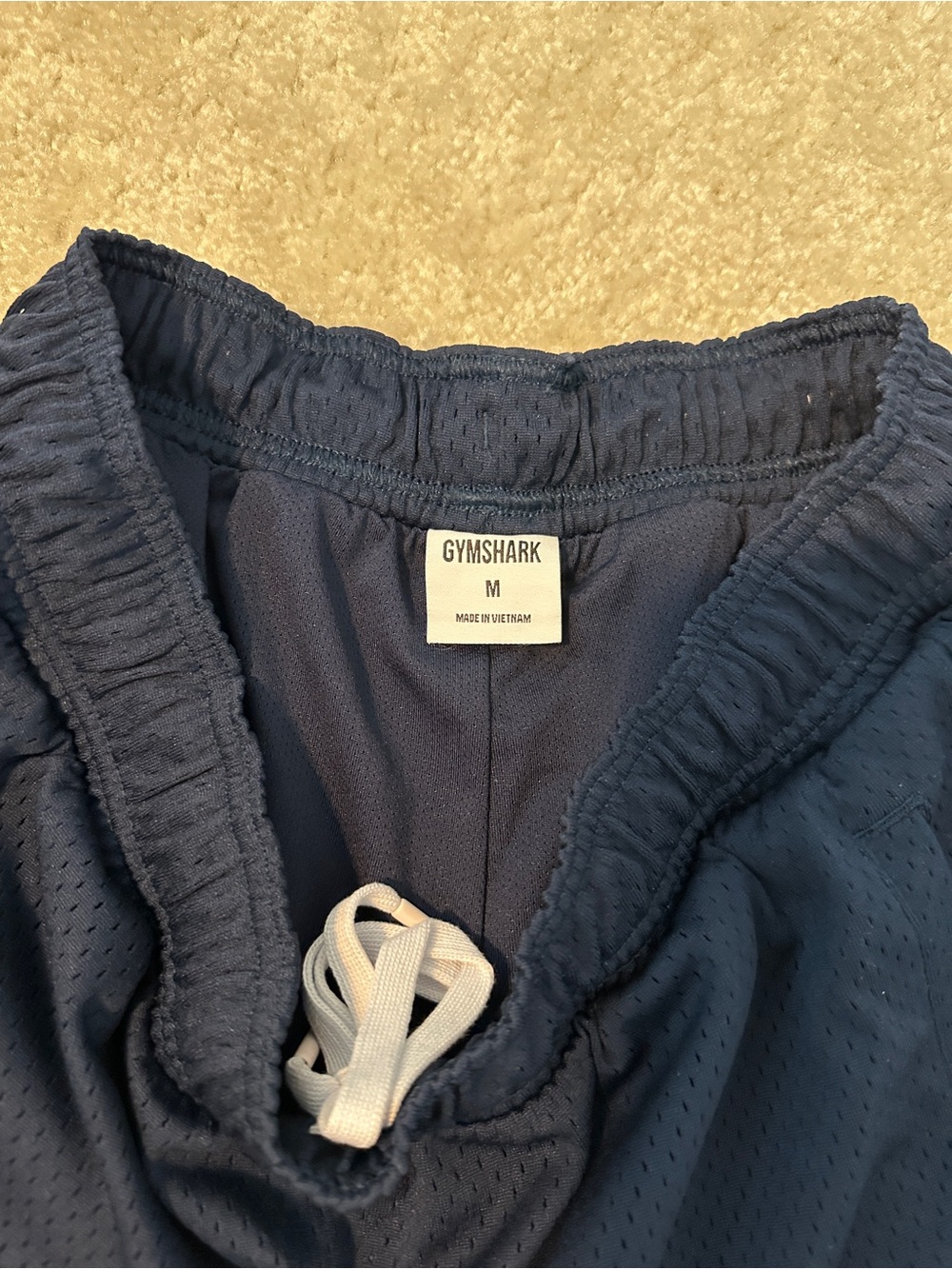 Gymshark Navy Blue Athletic Shorts with White Logos - Picture 2 of 3